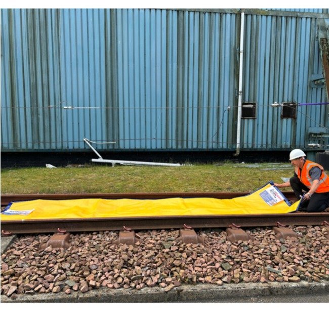 spilltrapper rail track mat